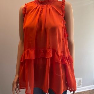 Beautiful orange sheer top